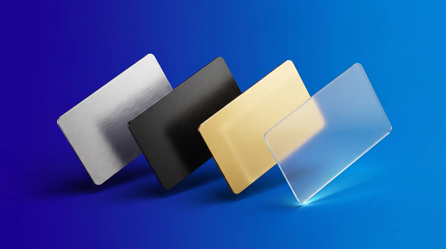 Four blank cards in steel, black, gold and clear glass, floating over a deep blue gradient.