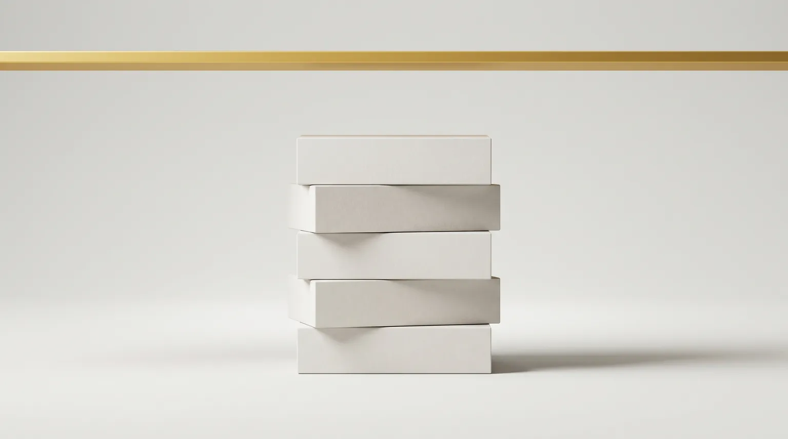 A stack of pale matte blocks stopping just short of a thin gold ledge above it.